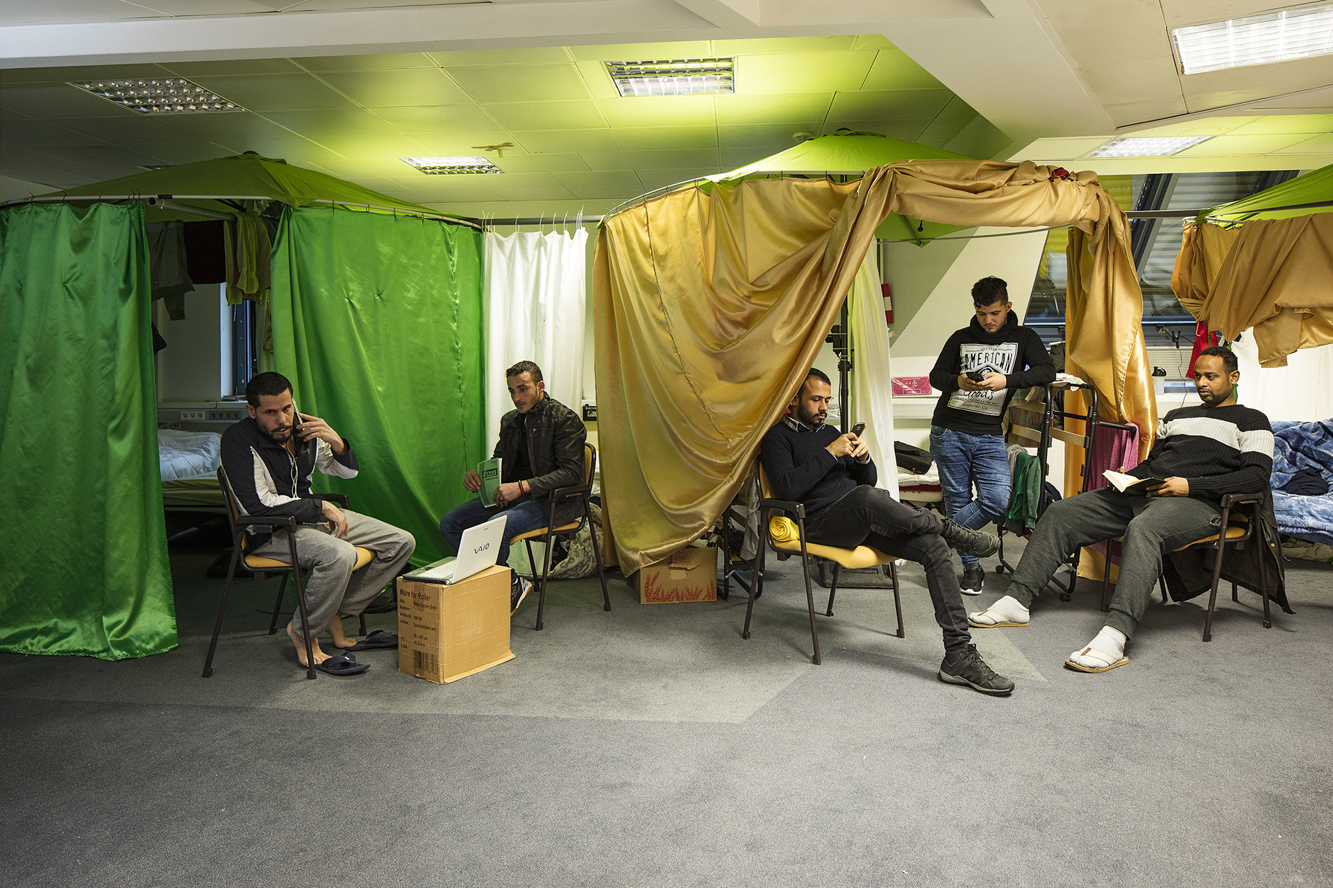 Alhilal Fihag, Alobaede Kaled, Bujalan Aswa, Alnaji Karar and Abdule Mohamed in an apartment for men on the fourth floor of Haus Pfeiffergasse